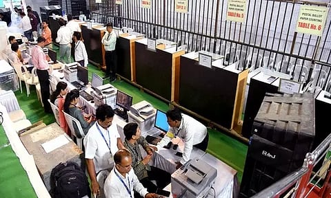 Polling officials (Photo/ANI)