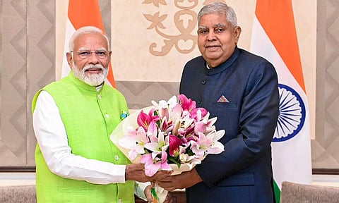 Vice-President Jagdeep Dhankhar greets PM Narendra Modi during their meeting at Vice-President's Enclave, in New Delhi (PTI)