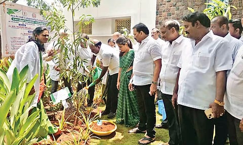 Health Minister Ma Subramaniam planting a sapling in Stanley Medical College campus
