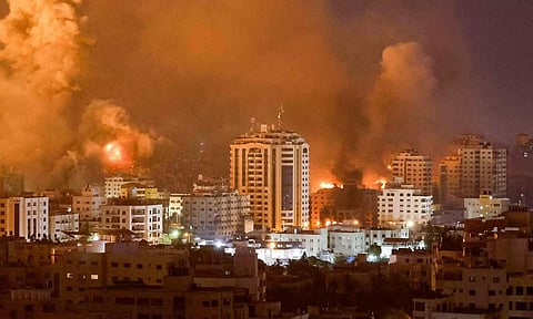 Israel pounds Gaza, mobilizes reserves, as death toll climbs on both sides (Photo/Reuters)