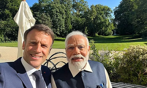 French President Emmanuel Macron with Prime Minister Narendra Modi (Photo: X)