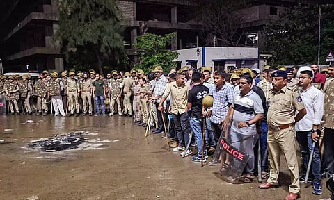 Security personnel deployed after clashes erupted over Junagadh Municipal Corporation’s anti-encroachment drive near the Majewadi Gate, in Junagadh district (PTI)