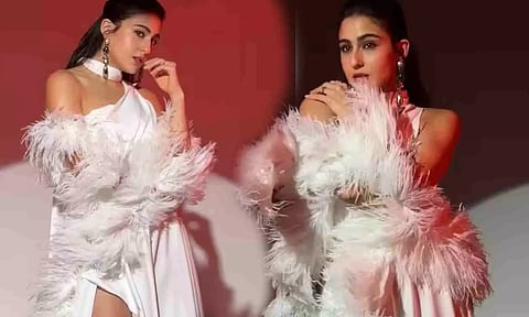 Sara Ali Khan dazzles in white thigh-high slit gown with feather sleeves, dewy makeup