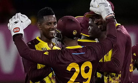 West Indies players celebrates after a wicket (PTI)