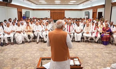 &nbsp;Prime Minister-designate Narendra Modi with NDA leaders during an interaction over tea (PTI)
