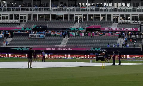 Toss delayed due to wet outfield (AP)