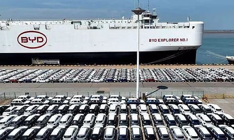 A drone view shows BYD electric vehicles before being loaded onto a vehicle carrier for export to Brazil (Reuters)