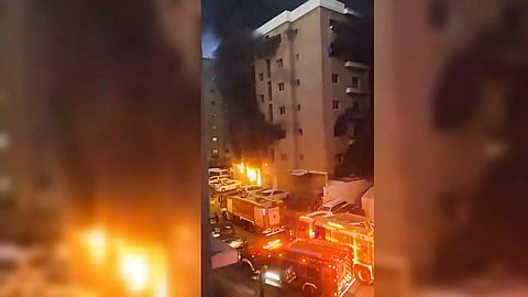 A fire engulfed a multi-storey building in Kuwait housing foreign workers, mostly Indians, on Wednesday, killing at least 49 people and injuring more than 50 others, according to officials (Photo/PTI)