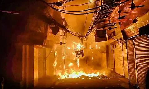 The fire at Bhagirath Palace market in North Delhi's Chandni Chowk area began on Thursday (Photo/PTI)