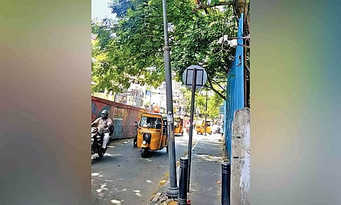 Slanting streetlight post on North Usman Road supported by a cable could fall at any moment