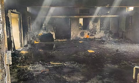 Charred remains at the site after a blast at an explosives-manufacturing factory (PTI)