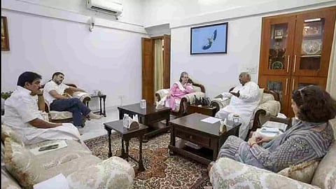 Congress leaders Sonia Gandhi, Rahul Gandhi, Priyanka Gandhi and K C Venugopal during a meeting at party president Mallikarjun Kharge’s residence in Delhi on Monday. (PTI)
