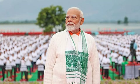 PM Modi adorns Assam's Gamosa at Yoga event in Srinagar, Union Minister Sarbananda Sonowal expresses gratitude