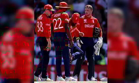 Chris Jordan celebrates his hat-trick against USA