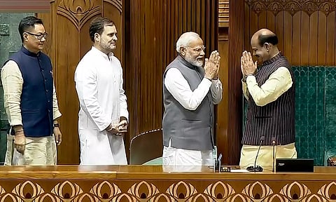 PM Narendra Modi, Rahul Gandhi and Kiren Rijiju escort Om Birla to the chair after the latter was elected as the Speaker of the House