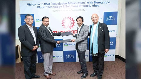 Mr. Jayateerth Nadgir, Chief Executive, MWTS (2nd from left) handing over the MoU to Mr. Srinivasan Vitoba and Dr. Krishna Madappa (Extreme Right), Founders of Jiva Water