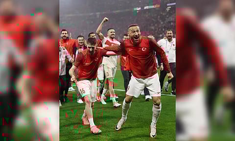 Players celebrating after the match