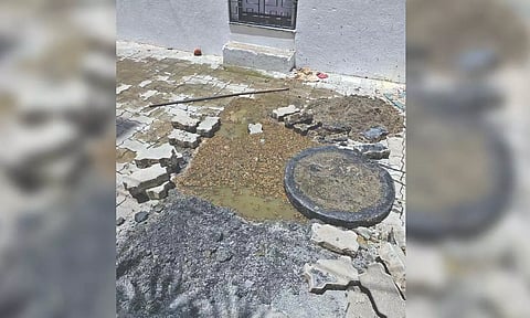 Overflowing drainage water from a manhole in the area