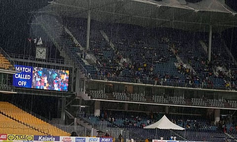The second T20 cricket match of a series between India Women and South Africa Women being called off due to rain as shown on the big screen (PTI)