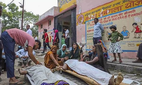 Bodies of victims of the Hathras stampede lie at a Hospital (PTI)