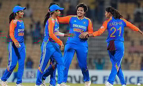 India's bowler Pooja Vastrakar with teammate celebrates after taking the wicket of South Africa team (PTI)