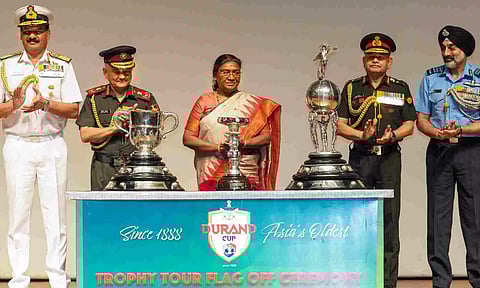 President Droupadi Murmu and other officials during the flag-off ceremony of Trophy Tour of the Durand Cup Tournament 2024 (PTI)