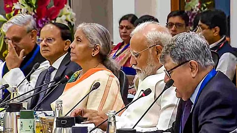 Prime Minister Narendra Modi, Union Finance Minister Nirmala Sitharaman and others during a meeting with economists at NITI Aayog, in New Delhi (Photo/PTI)