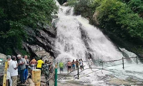 ‘Kavi Aruvi’ falls in Pollachi near Coimbatore received heavy water flow on Sunday