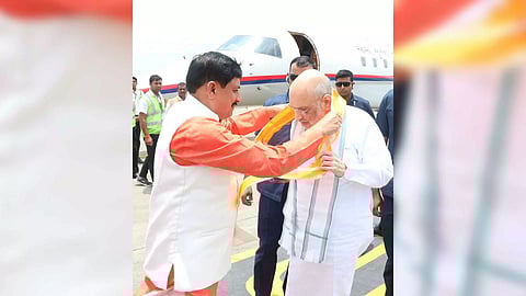 Union Home and Cooperation Minister Amit Shah being welcomed by Madhya Pradesh Chief Minister Mohan Yadav on his arrival, in Indore (Photo/PTI)