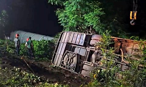 Rescue work underway after a collision between a bus and a tractor on the Mumbai-Pune Expressway (PTI)