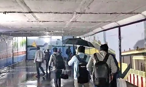 Video grab of commuters struggling to walk through subway