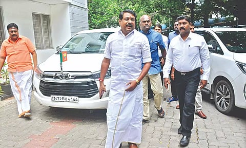 BJP legislator Nainar Nagendran arrives for an inquiry at the CB-CID headquarters in Chennai on Tuesday