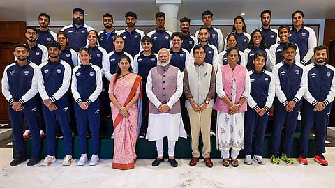 Prime Minister Narendra Modi with athletes and support staff (Photo/PTI)
