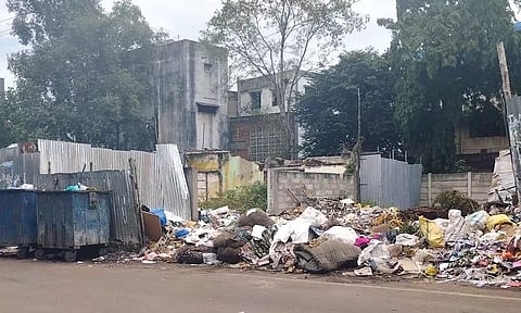 Piled-up waste on Ramanujam Iyer Street in Old Washermenpet