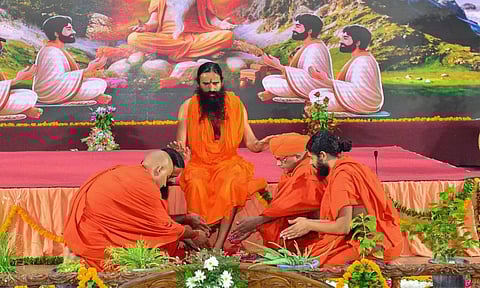 When Ramdev can reveal identity, why can't Rehman: Yoga guru backs Kanwar Yatra order