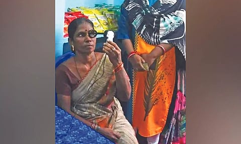 Iris check is being done for one of the beneficiaries of Public Distribution System