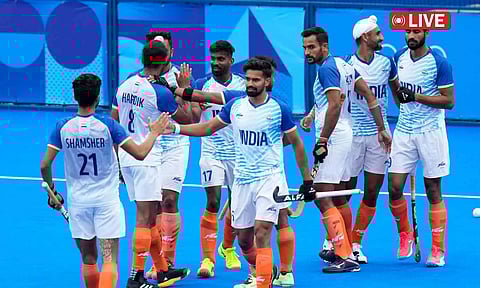 India's Mandeep Singh, second right, celebrates with teammates (Photo: PTI)&nbsp;