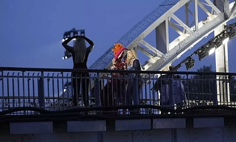 Drag queen Piche prepares to perform, at the Debilly Bridge in Paris (AP)