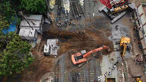 Heavy machineries engaged for insertion of pre-cast boxes for culvert