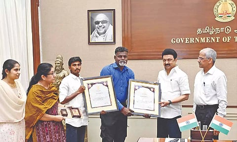 S Vijayakumar (L) and A Maria Michael, both from Thoothukudi, with Chief Minister MK Stalin