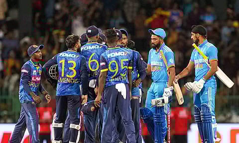 Mohammed Siraj and Arshdeep Singh shake hands with Sri Lanka players after the first ODI ended in a tie