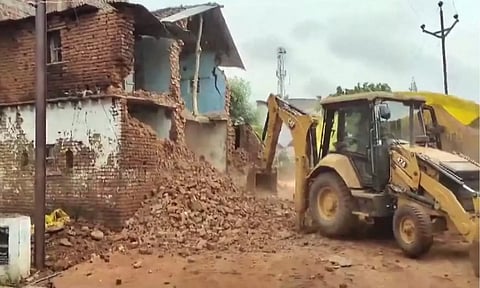 Rescue work underway after a wall collapsed at Shahpur village (PTI)