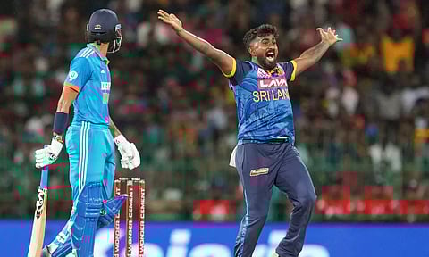 Sri Lanka's Charith Asalanka takes the catch of India's Axar Patel during the second ODI cricket match&nbsp;