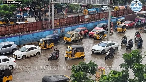 Vehicles struggle through a pool of water after a early morning rain at Omr (Photo: Justin George)