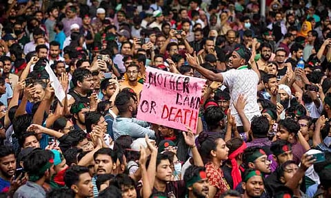 People participate in a protest march against Prime Minister Sheikh Hasina (PTI)&nbsp;