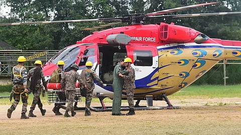 An Indian Air Force helicopter, in joint efforts with the Indian Army, during the seventh day of the rescue operation