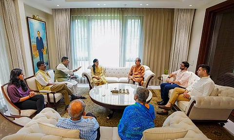 Uddhav Thackeray along with his son Aaditya Thackeray and party leader Sanjay Raut during a meeting with Arvind Kejriwal's wife Sunita Kejriwal and his parents