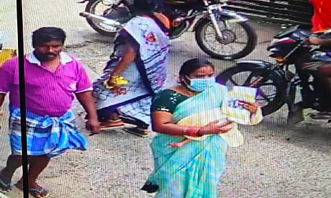 A CCTV image of a woman with the abducted newborn boy at the Salem GH