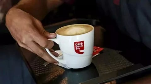 Person have a Cafe Coffee Day drink&nbsp;