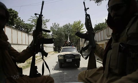 Taliban fighters in patrol (AP)